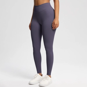 Detail of high-waist seamless yoga leggings in grey-purple with moisture-wicking fabric
