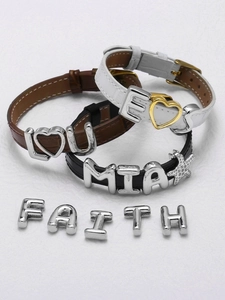 Custom DIY leather bracelets featuring assorted gold letters and star charm accessories