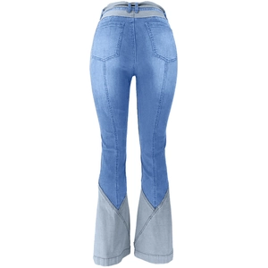 Back view of high-waist flared jeans featuring blue and grey denim patchwork and pockets