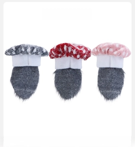 Rear view of mushroom-shaped gnome bottle covers in black, red, and pink spotted patterns