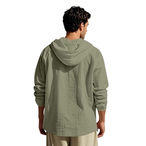 Back view of a men's sage green linen hooded shirt with premium fabric texture detail