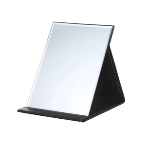 Portable rectangular folding vanity mirror with a black faux leather stand for tabletop use
