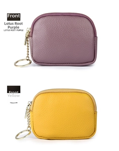 Detail of leather mini coin purses in lilac and yellow with textured pebble finish