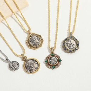 Vintage tribal coin pendant necklace with embossed figure and luxury gold twist chain