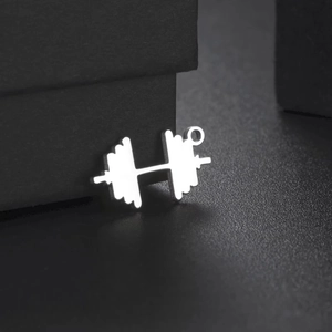 Silver stainless steel dumbbell pendant for DIY jewelry on a sleek black background