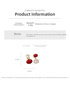 Dettaglio orecchini vintage in zircone con pietre rosse e trasparenti placcati oro