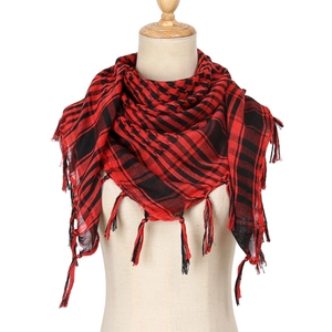 Red and black houndstooth desert tactical shemagh scarf with tassels on a mannequin