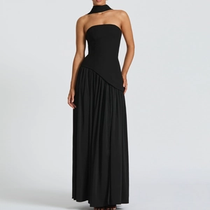 Elegant black strapless evening dress with pleated skirt and matching choker necklace