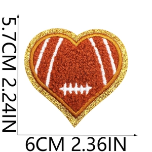 Detail showing dimensions of heart-shaped football embroidery patch with gold sequins