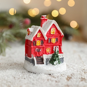 Miniature resin red Christmas cottage with snow details and tiny pine tree figurine