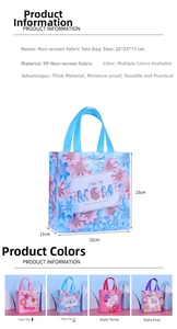 Detail of multi-color non-woven gift bags featuring floral prints and sturdy handles