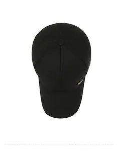 Top down view of black cotton baseball cap showing the crown and gold metal side logo