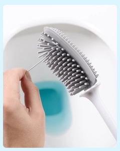Macro detail of gray TPR silicone toilet brush bristles with ergonomic white handle