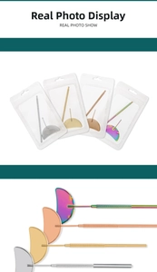 Detailed close-up of D-shaped eyelash mirrors in silver, gold, rose gold and rainbow colors