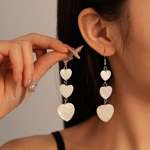 Three-tier pearlescent acrylic heart drop earrings with elegant silver fishhook dangles