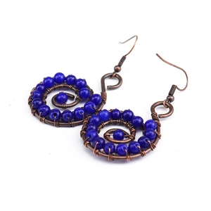 Detailed wire-wrapped earrings with antique bronze finish and deep blue round beads