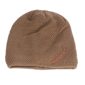 Detailed close-up of brown knit beanie showing waffle texture and leaf embroidery