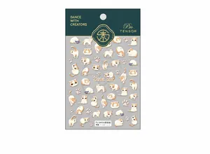 Detailed view of 5D embossed cute cat nail stickers with textured orange and beige designs