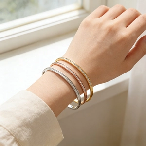 Three-piece titanium steel bangle set in gold, rose gold and silver with zircon stones