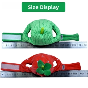 Watermelon and strawberry plush pet hats with velcro straps and dimensions shown