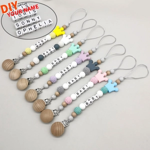 Handmade beech wood and silicone crown pacifier clips in various macaron colors