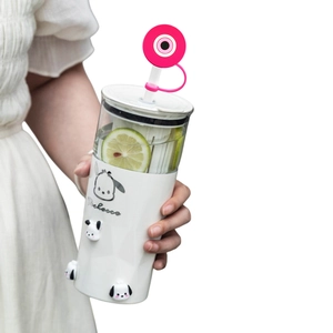 Reusable evil eye straw cover and Pochacco charms on a white Stanley cup with straw