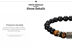 Detailed shot of men's matte black beads and tiger eye stones with micro-inlaid gold spacers