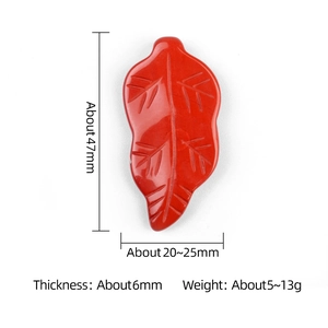 Natural red agate leaf pendant 47mm with detailed vein carving on white background