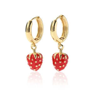 Close-up of strawberry drop earrings with gold metal hoops and glossy red enamel finish