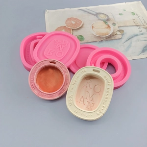 Pink oval silicone mold for aromatherapy plaster and chocolate with embossed text