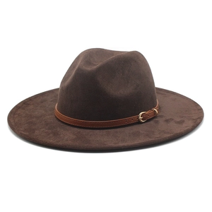 Detailed view of dark brown wide-brim cowboy hat with fine leather band and gold buckle