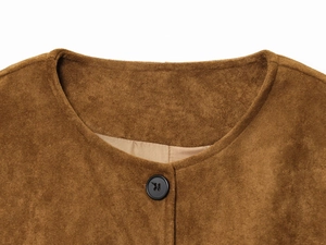 Detail view of the brown suede jacket featuring a round neckline and a single black button