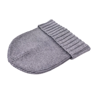 Detailed close-up of dark grey knitted beanie showing fine ribbing and fold-over cuff