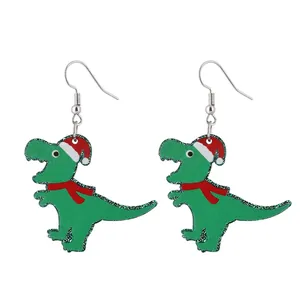 Green glitter dinosaur earrings with Christmas hat and red scarf for holiday gifts