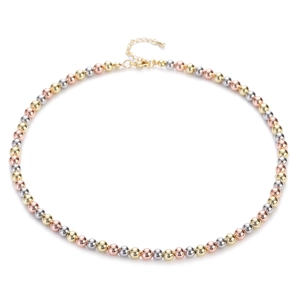 Detailed view of the tri-color metal beaded necklace with adjustable gold extension chain