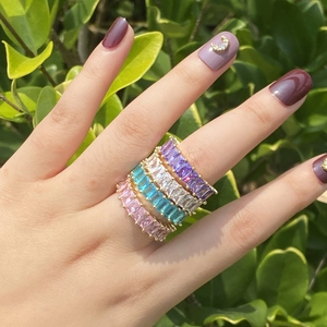 18K gold plated rings set with colorful rectangular zircons worn in natural light
