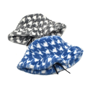 Detail of plush faux fur bucket hats with houndstooth patterns and adjustable inner drawstring