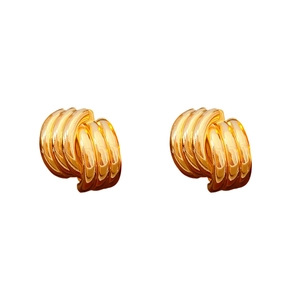 Minimalist geometric spiral knot earrings in gold finish with silver needle backing