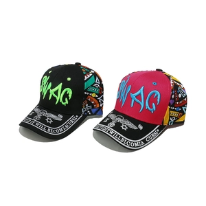 Detailed macro view of hip-hop baseball caps with vibrant ethnic patchwork and embroidery