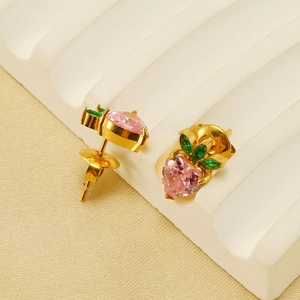 Chic strawberry stud earrings with pink heart crystals and green leaves in 18K gold finish
