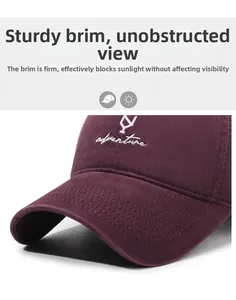 Detail of vintage purple cotton baseball cap with adventure embroidery and sturdy brim