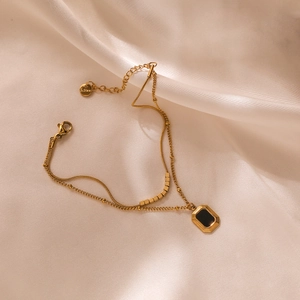 Elegant gold double-layer stainless steel bracelet with square black stone pendant