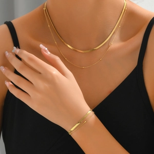 Elegantes mehrlagiges Gold-Schlangenkette Halsketten- und Perlenarmband-Set für Damen