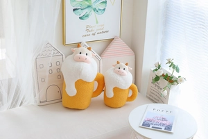 Detailed plush beer mug toys with cow features showing soft texture in a cozy home setting