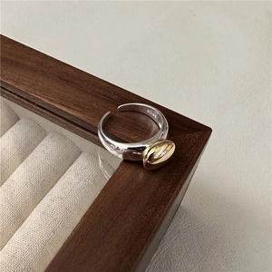 Minimalist S925 sterling silver open ring featuring a contrasting gold oval element