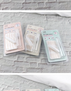 Three sizes of lace double eyelid stickers with spray bottle and tweezers on white fabric