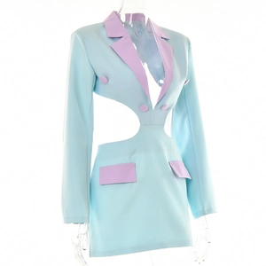 Detail of light blue blazer dress with pink lapels and sexy waist cut-out design