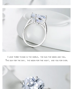 Macro view of cushion-cut 5ct zircon ring with pavé diamonds and romantic English poem