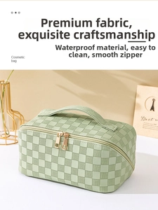 Detail showing waterproof checkered leather texture and smooth golden metal zipper