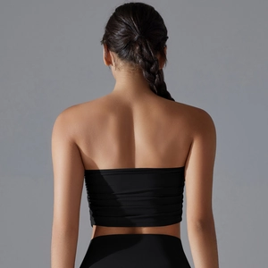 Rear view of black strapless bandeau yoga top showing fit and seamless stretch fabric
